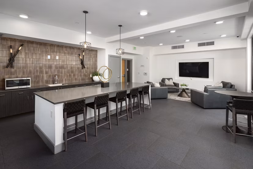 Modern clubhouse with sleek design and social spaces at Marchon Apartments