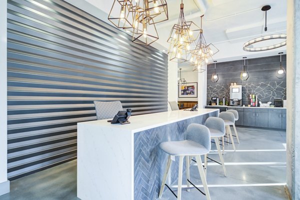 Modern clubhouse with sleek design and social spaces at Marchon Apartments