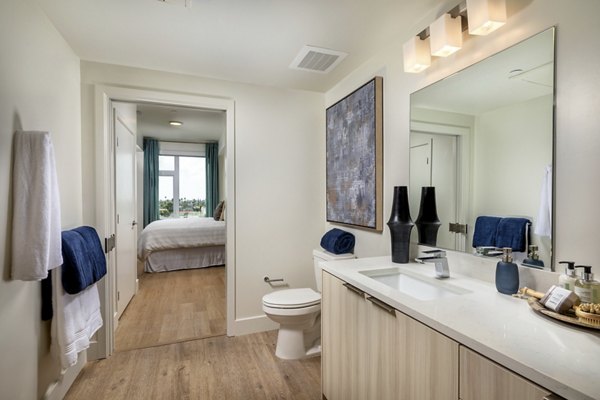 Luxurious bathroom with marble countertops and sleek fixtures in Azul North Park Apartments