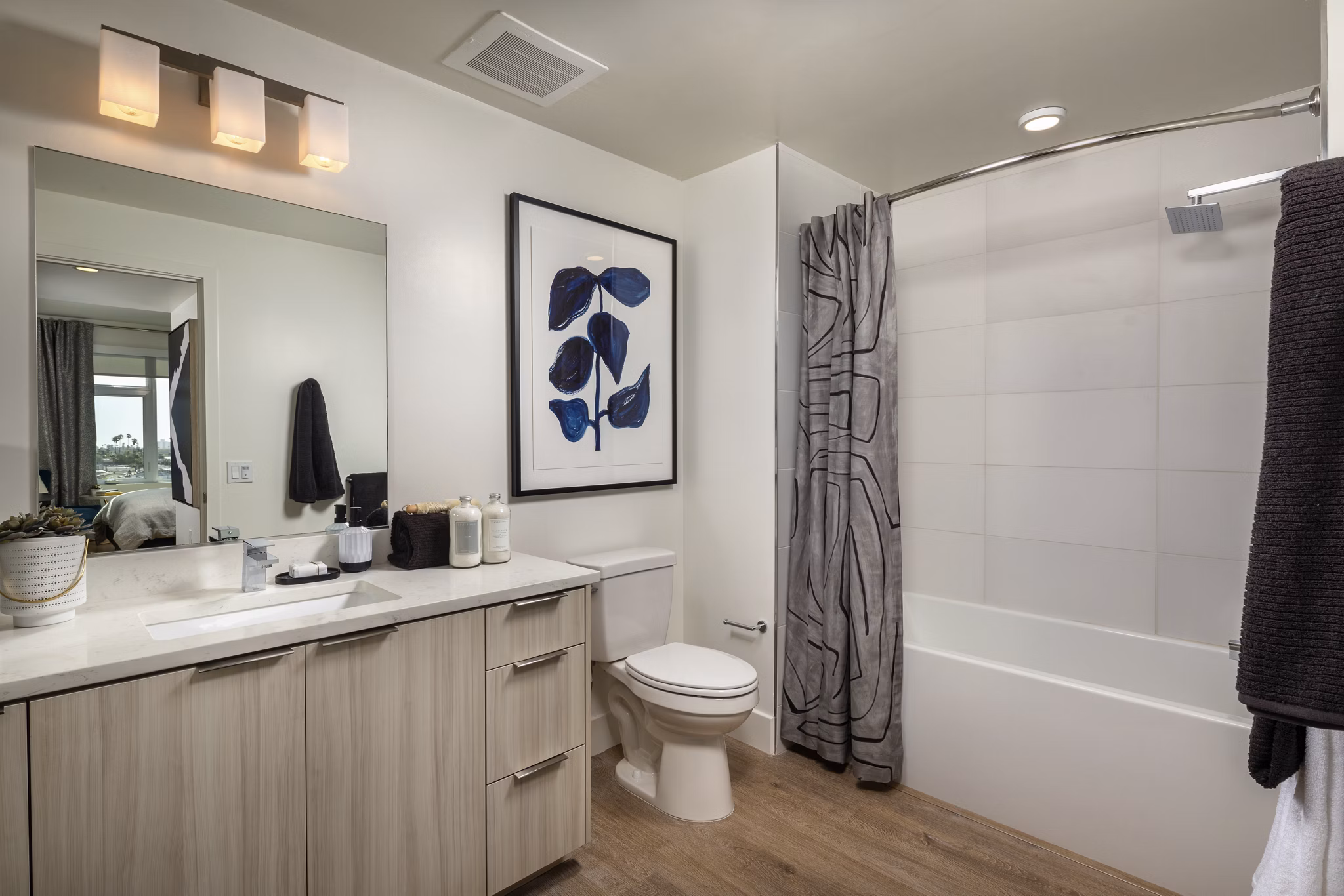 Azul North Park Apartments: Modern bathroom featuring sleek fixtures and marble countertops for luxury living