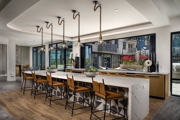 Clubhouse with modern seating and decor at Azul North Park Apartments, offering luxury living spaces for relaxation and community gatherings