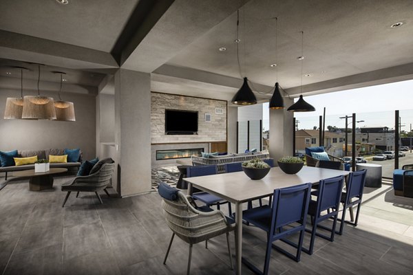 Clubhouse with modern design and comfortable seating at Azul North Park Apartments