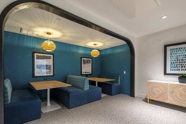 Clubhouse with modern design at Azul North Park Apartments, featuring luxury amenities and stylish seating areas