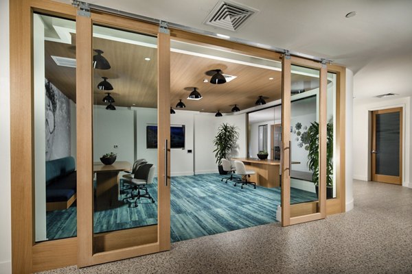 Modern clubhouse with sleek design at Azul North Park Apartments, featuring luxury amenities for residents to enjoy leisure and social activities