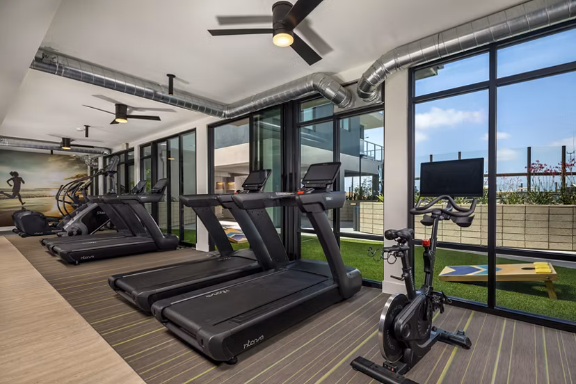 Modern fitness center with cutting-edge equipment at Azul North Park Apartments offering a luxury workout experience
