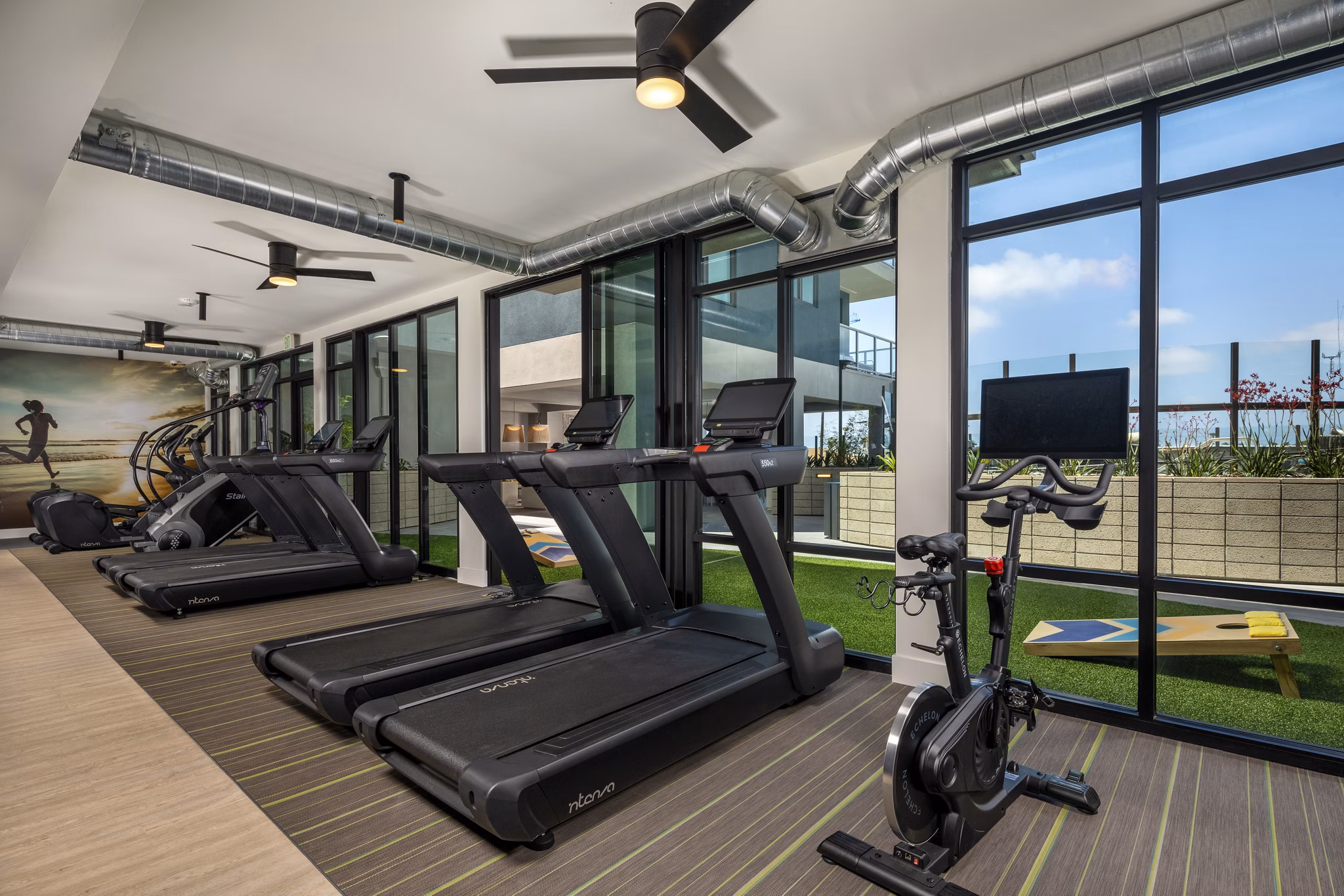 Modern fitness center with cutting-edge equipment at Azul North Park Apartments offering a luxury workout experience