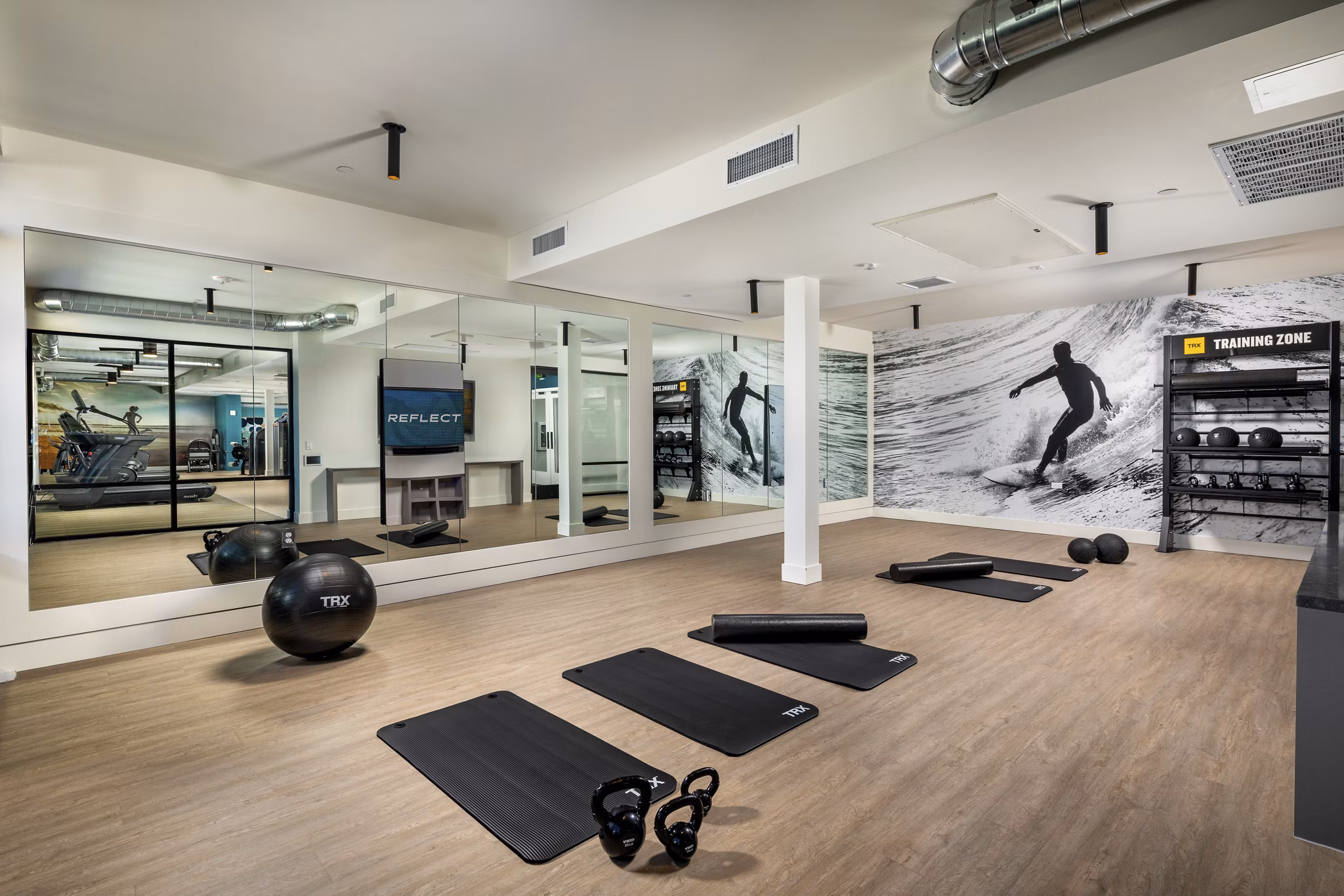 State-of-the-art yoga/spin studio at Azul North Park Apartments offering modern fitness amenities
