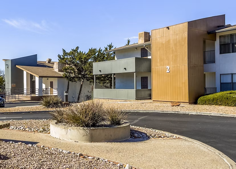 Canoan Village Apartments: Luxurious modern apartment building in a scenic neighborhood