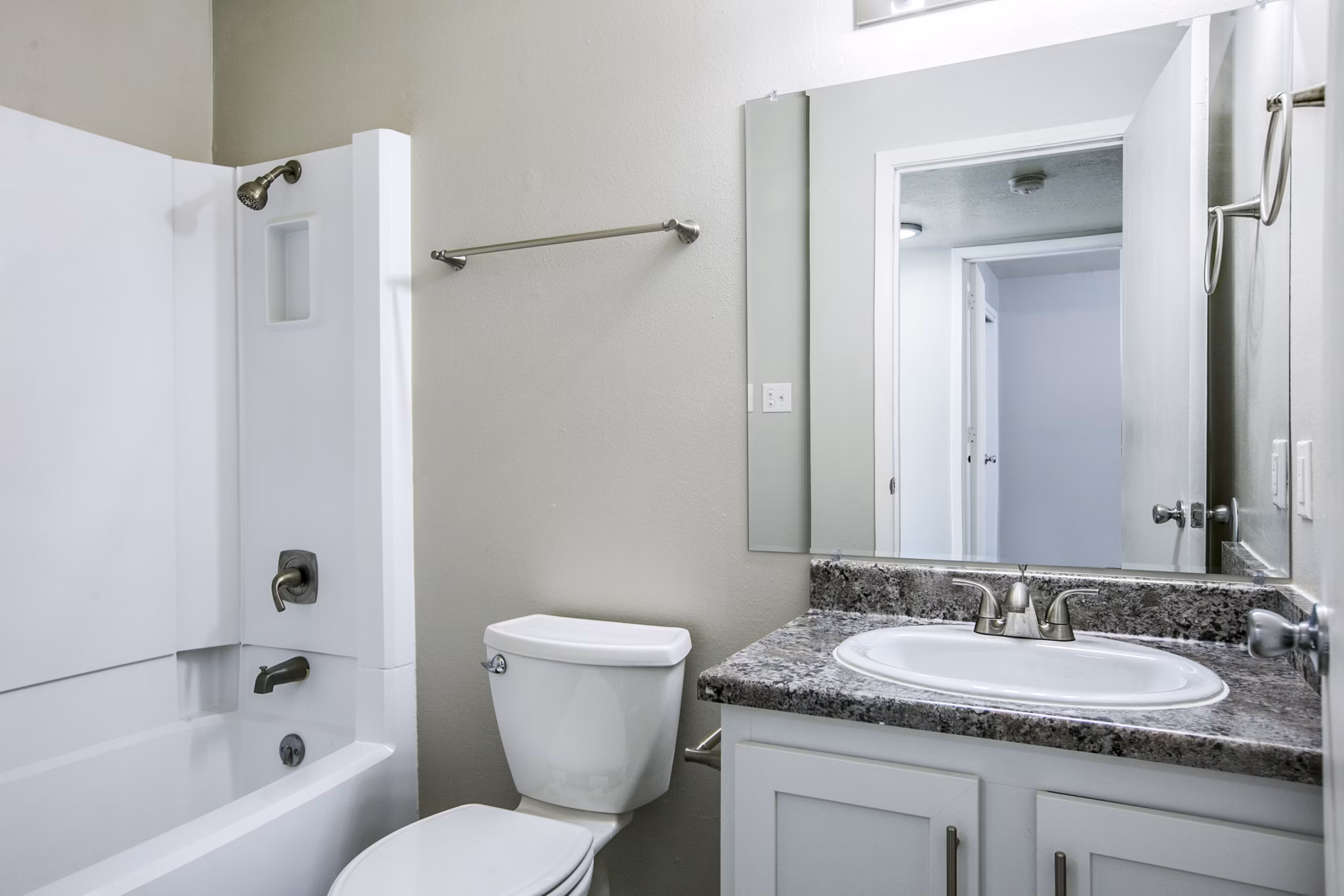 Bathroom with sleek fixtures and elegant design at Canoan Village Apartments
