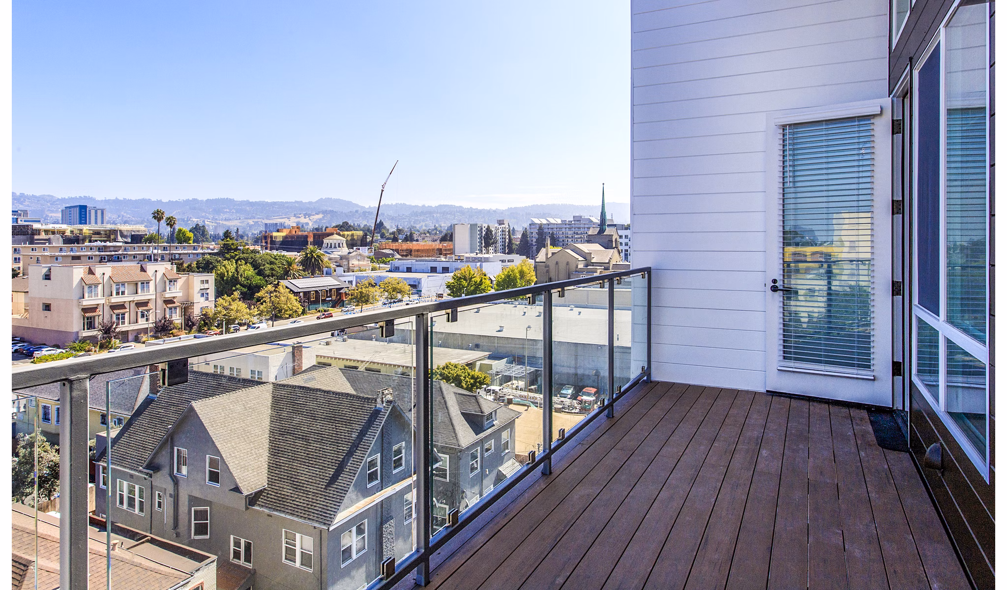 Patio with stylish outdoor seating at Telegraph Arts Apartments, perfect for relaxation and enjoying scenic views