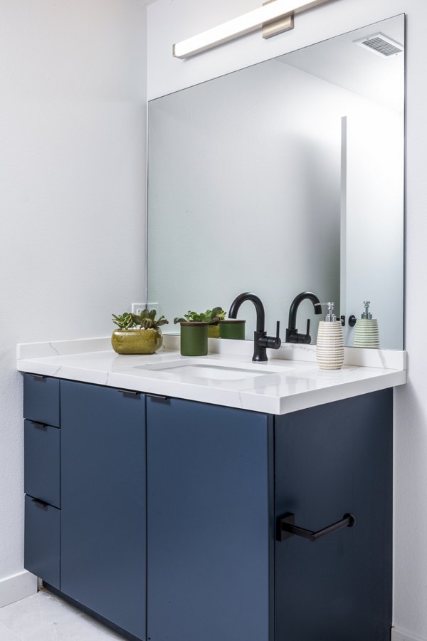 Elegant bathroom with modern fixtures at The Charlie Mar Vista Apartments