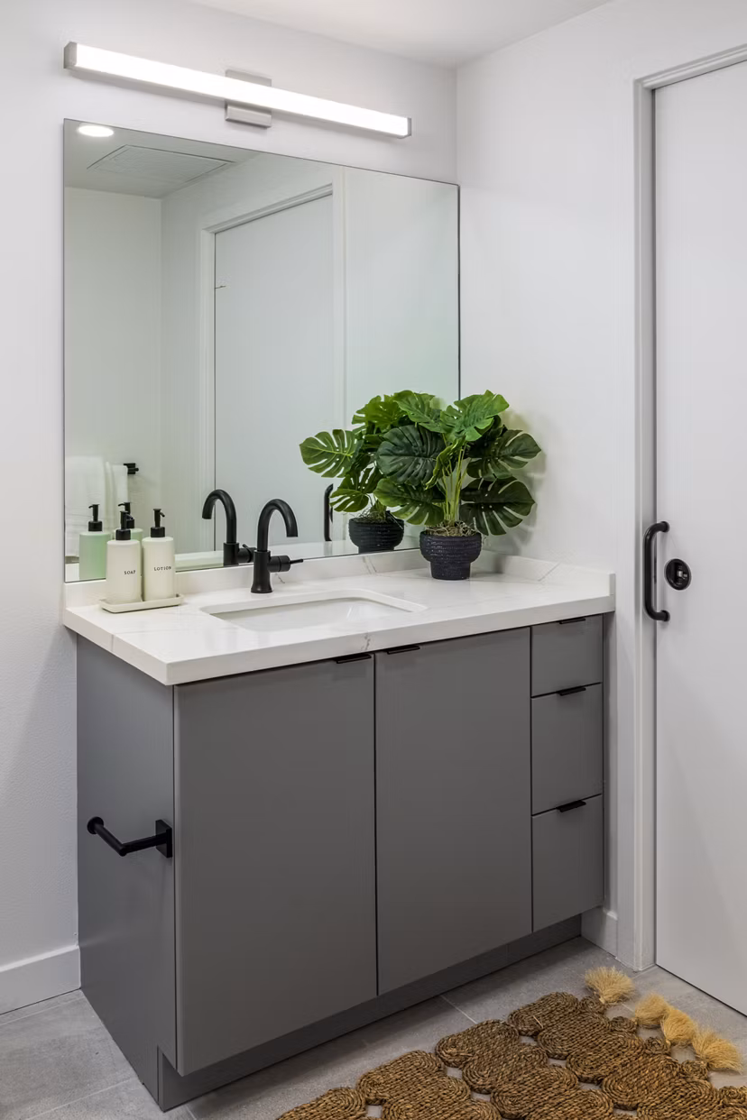Modern bathroom with sleek fixtures at The Charlie Mar Vista Apartments luxury residences