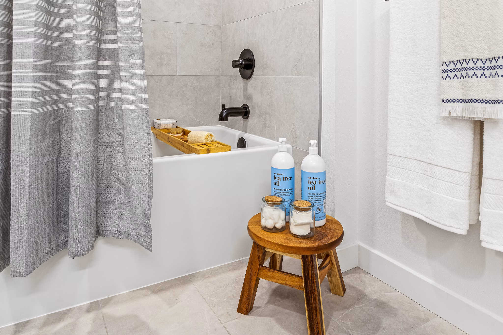 Bathroom featuring sleek fixtures and modern design at The Charlie Mar Vista Apartments