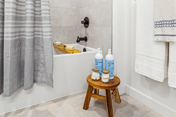 Bathroom featuring sleek fixtures and modern design at The Charlie Mar Vista Apartments
