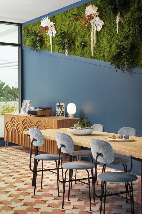 Clubhouse featuring modern decor and ample seating at The Charlie Mar Vista Apartments