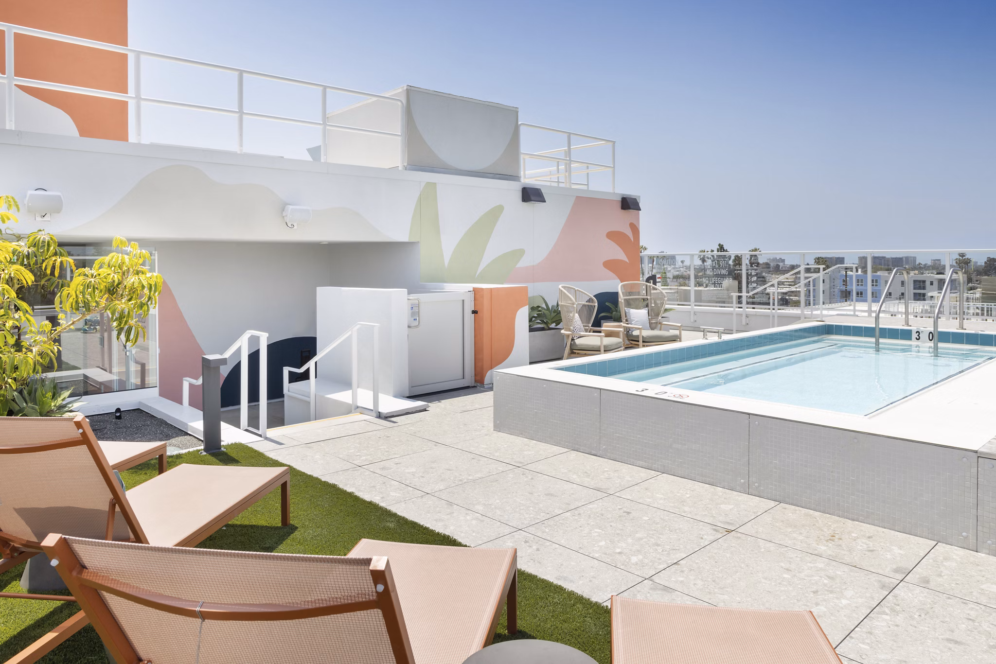 Spacious patio with modern seating at The Charlie Mar Vista Apartments