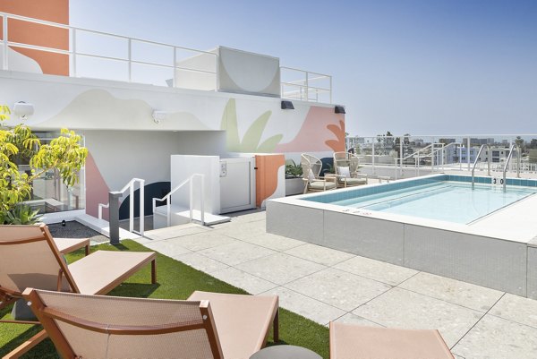 Spacious patio with modern seating at The Charlie Mar Vista Apartments