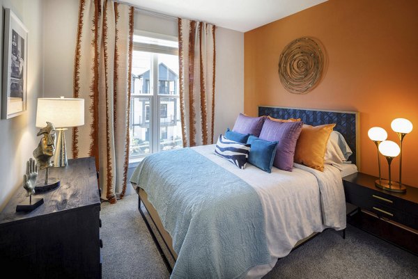 Modern bedroom with stylish decor at Broadstone Pullman Apartments