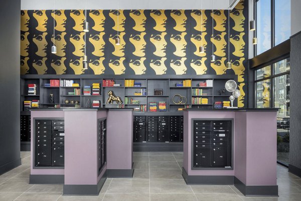 Modern mail room with secure package lockers at Broadstone Pullman Apartments