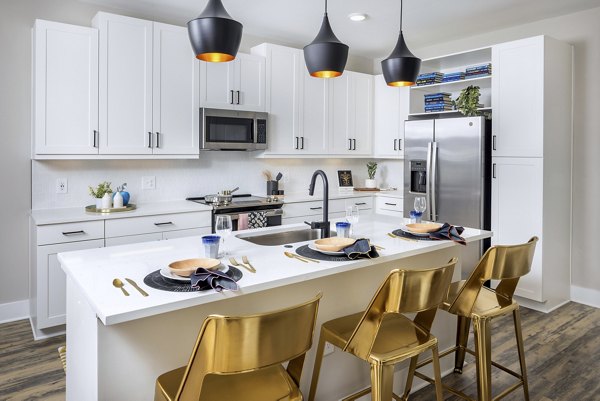 Contemporary kitchen featuring stainless steel appliances at Broadstone Pullman Apartments