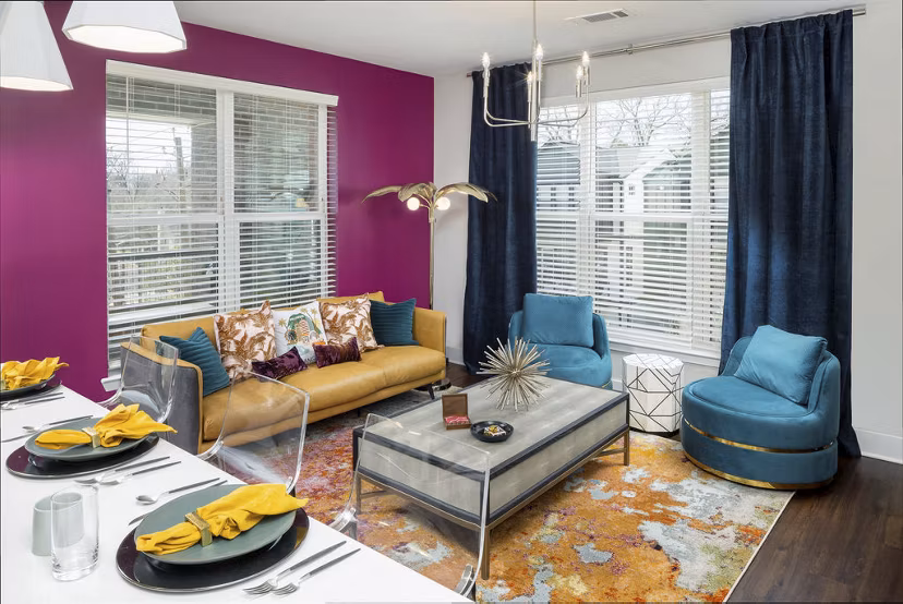 Modern living room with stylish dÃ©cor at Broadstone Pullman Apartments, featuring ample natural light and contemporary furnishings