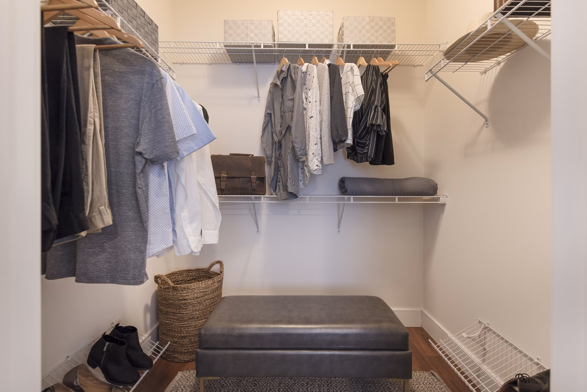 Walk-in closet with ample storage space in The Eliot on Ocean Apartments luxury unit