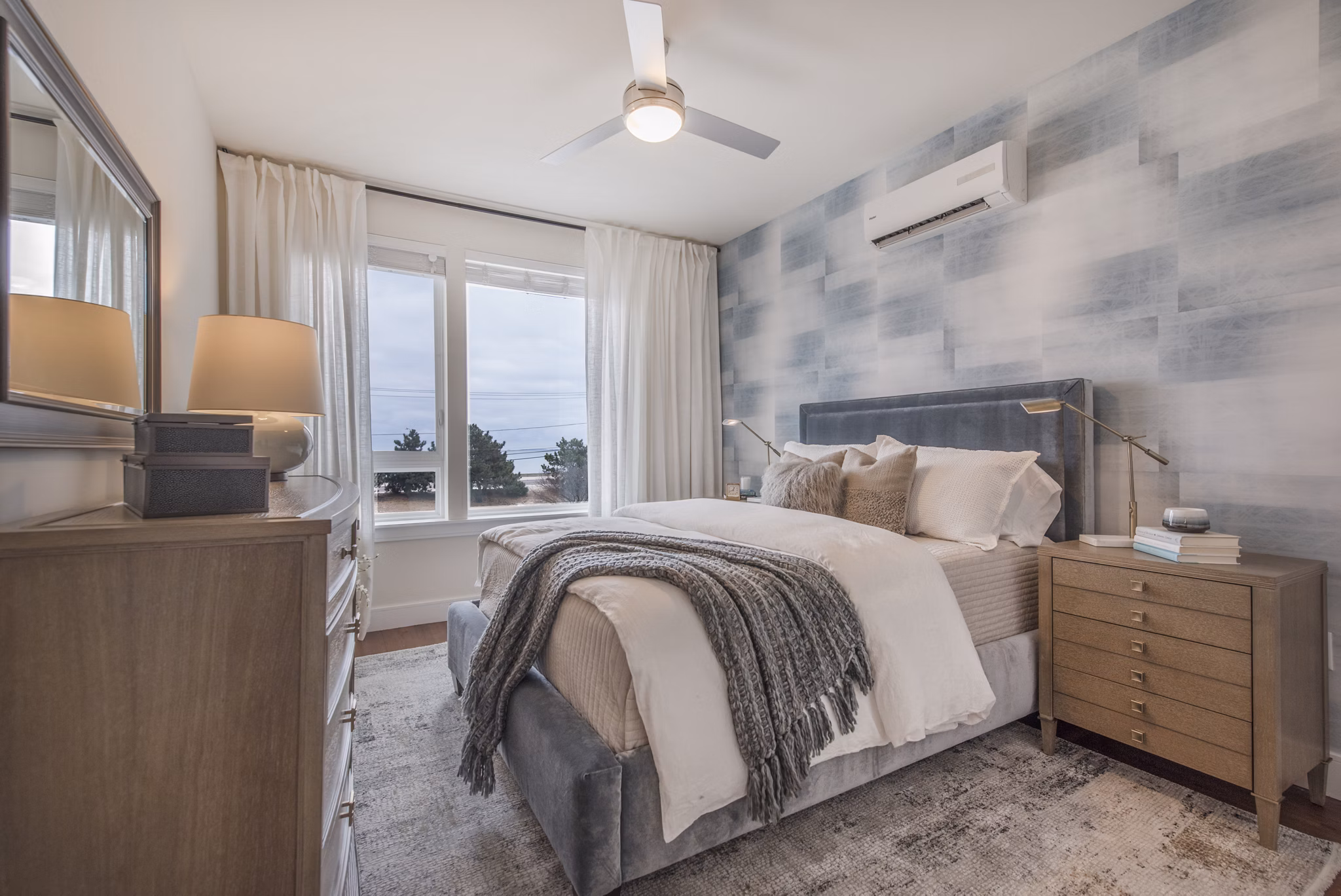 Cozy bedroom with ocean views at The Eliot on Ocean Apartments
