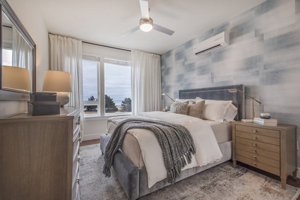 Cozy bedroom with ocean views at The Eliot on Ocean Apartments