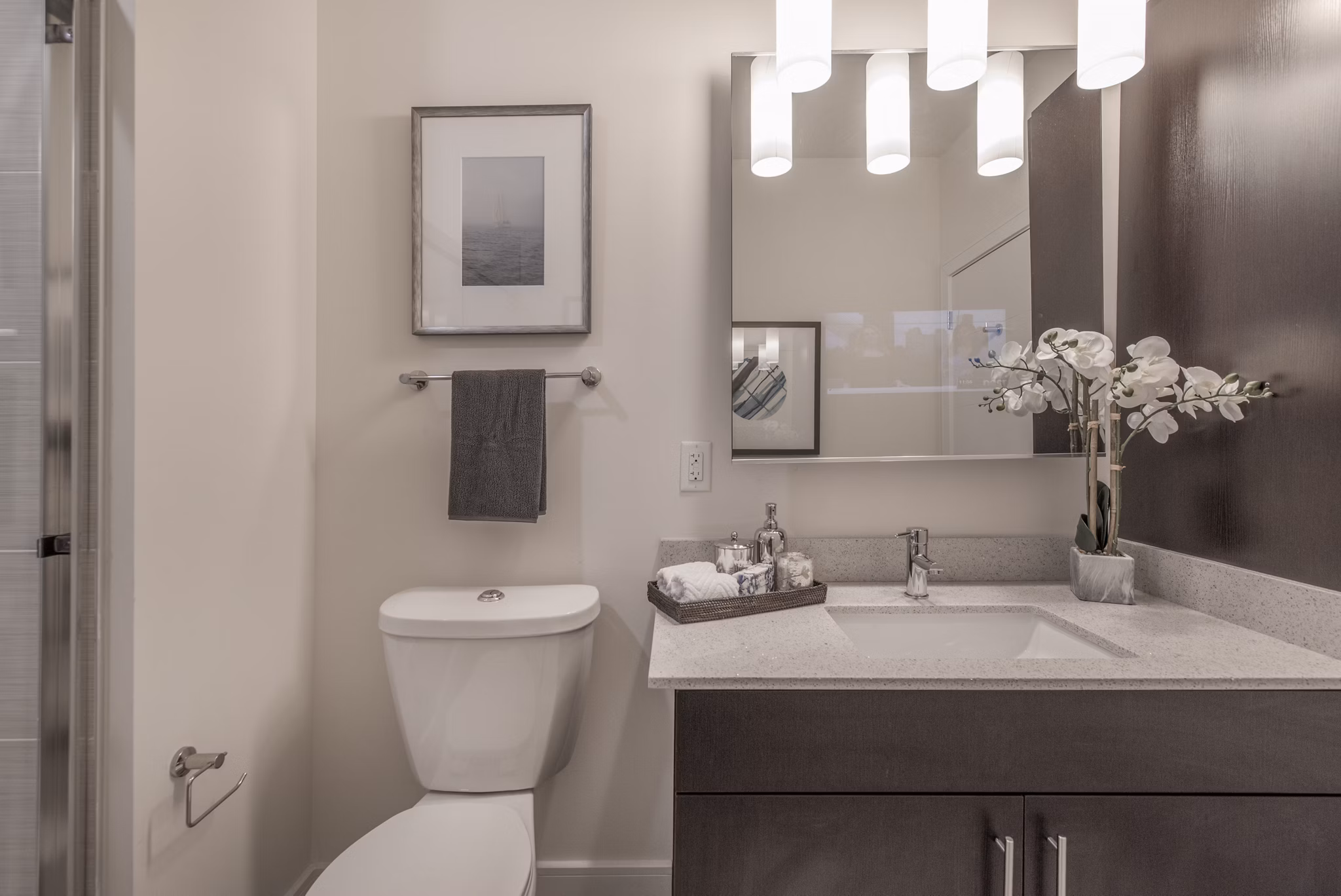 Luxurious bathroom with marble countertops and modern fixtures at The Eliot on Ocean Apartments