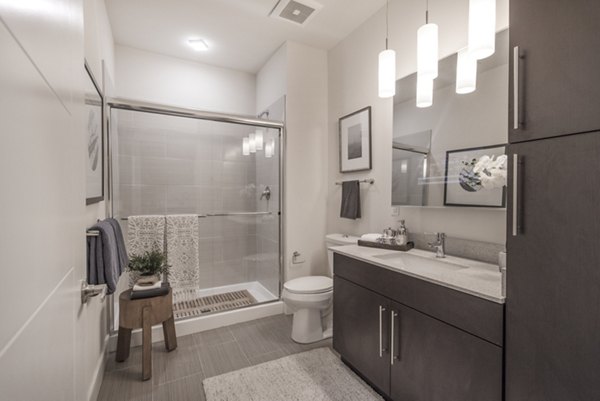Spacious bathroom with modern fixtures at The Eliot on Ocean Apartments, a luxurious option for refined living