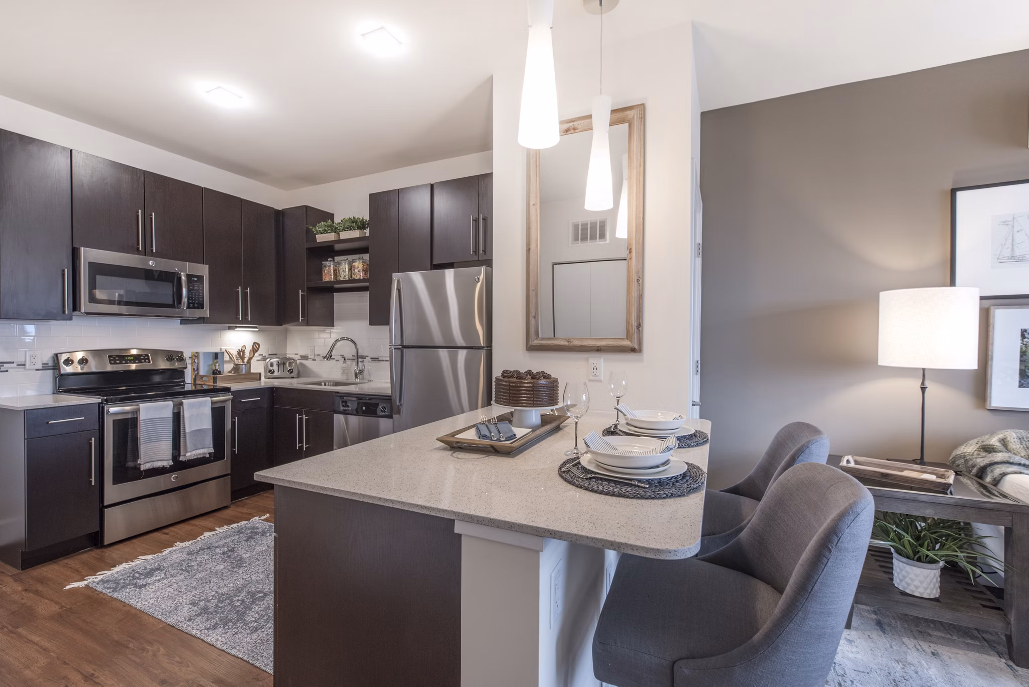 Modern kitchen featuring sleek countertops and stainless steel appliances at The Eliot on Ocean Apartments