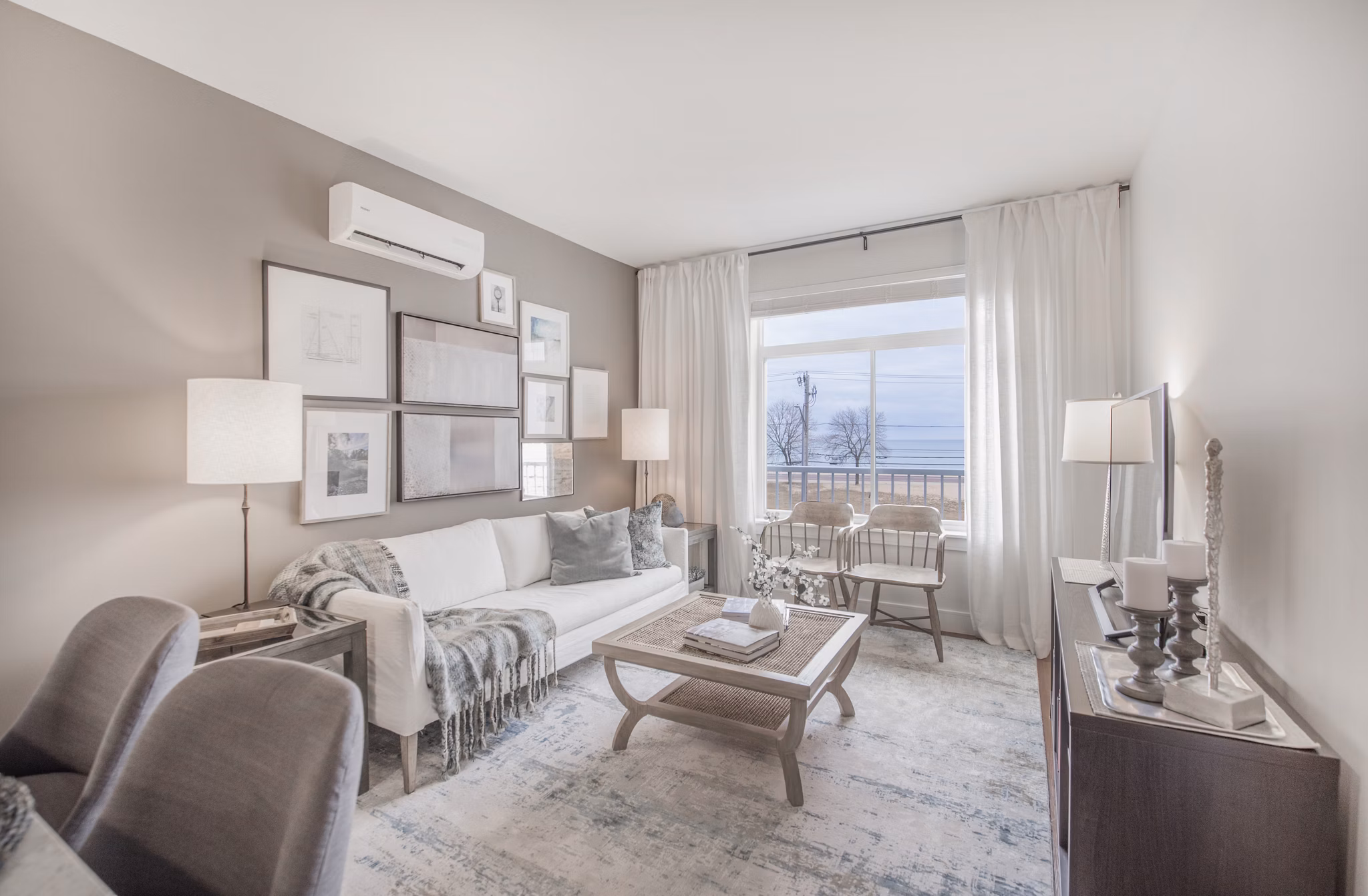 Modern living room with sea views at The Eliot on Ocean Apartments, offering luxury coastal living near  training facilities