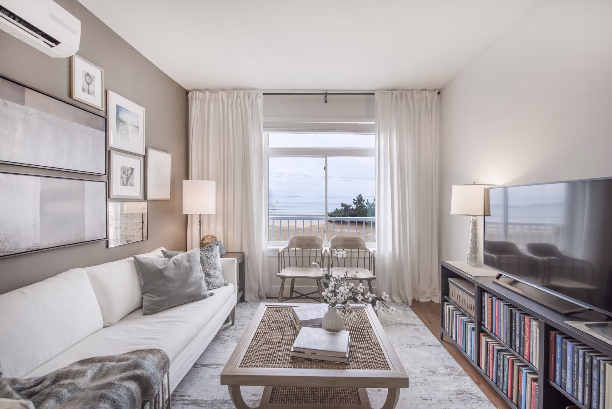 Spacious living room with ocean views in The Eliot on Ocean Apartments, perfect for seaside relaxation and modern comfort