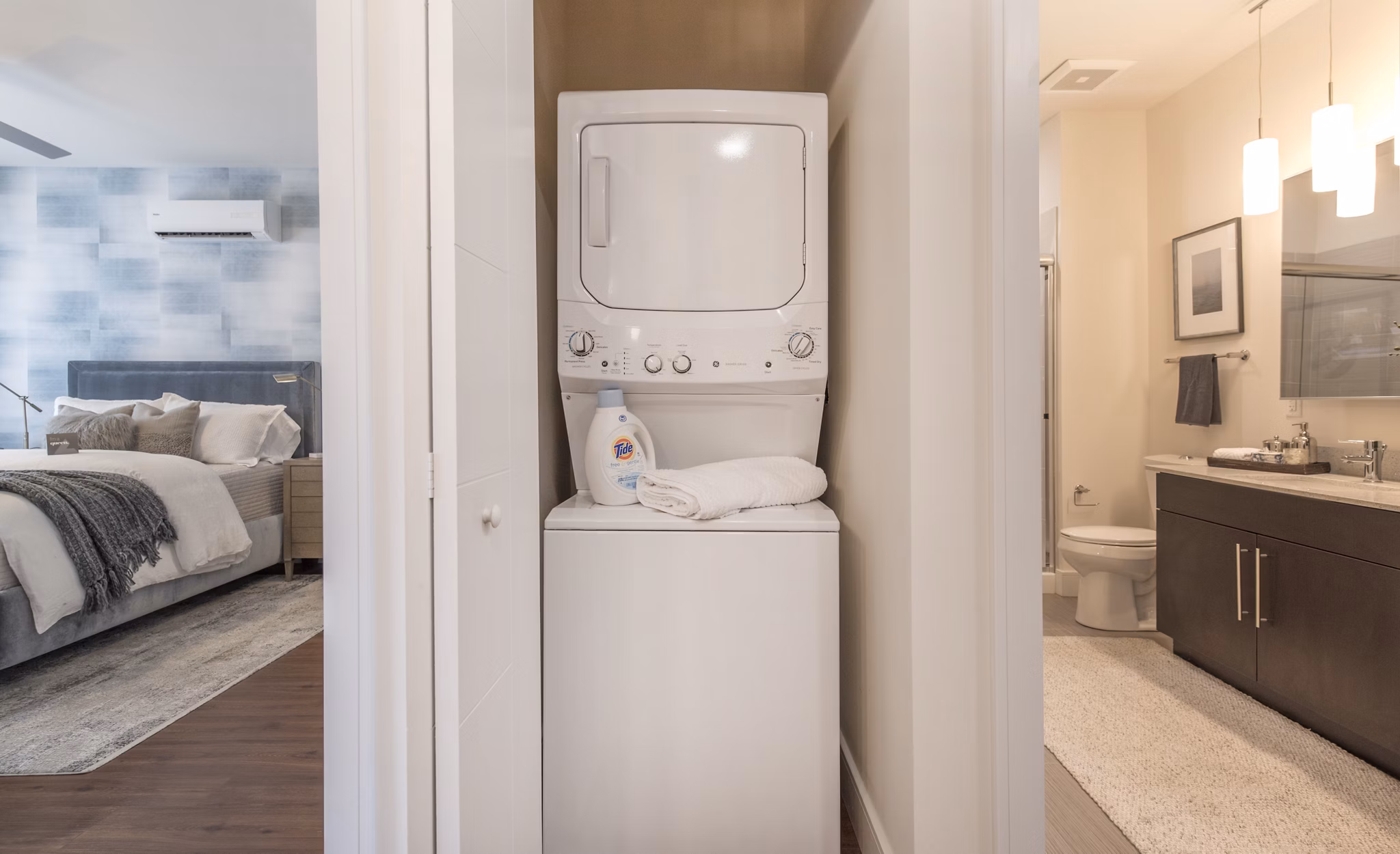 Laundry room with modern appliances at The Eliot on Ocean Apartments