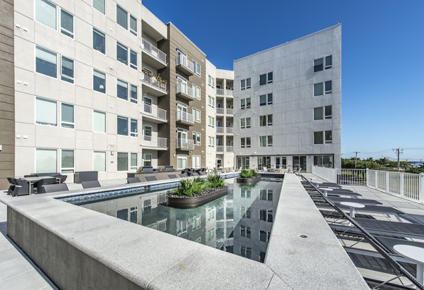 Exterior view of The Harvey, luxury apartments in Boston, showcasing modern design and urban living