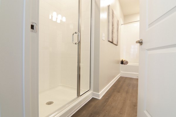 Bathroom with modern fixtures and sleek design at The Ravelle at Ridgeview Apartments