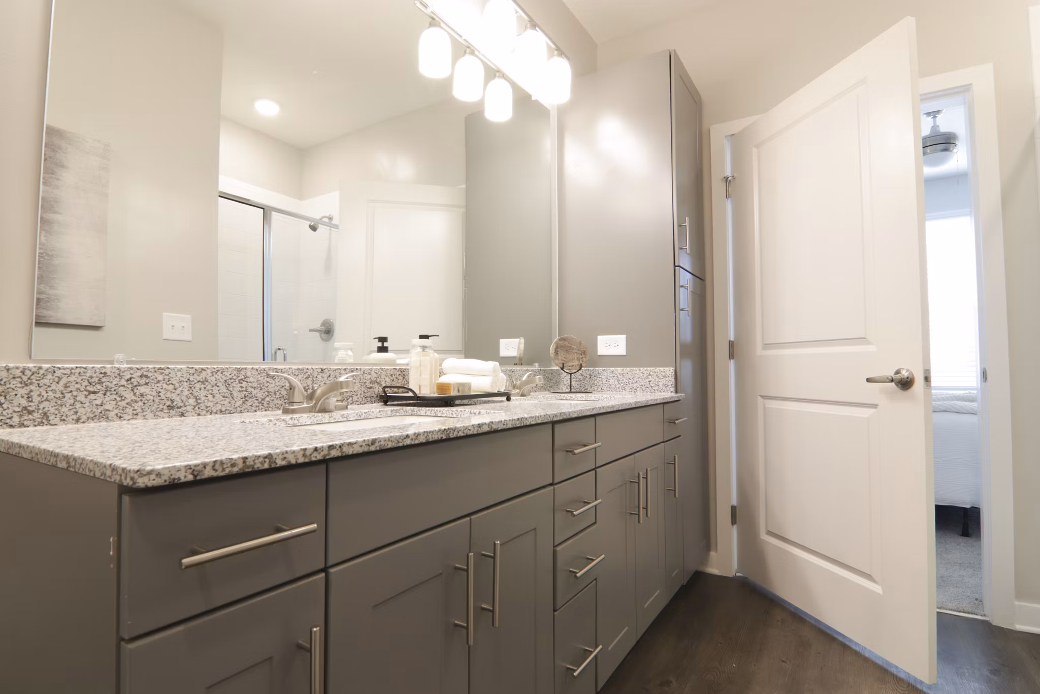 Bright bathroom with modern fixtures in The Ravelle at Ridgeview Apartments