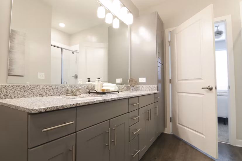 Bright bathroom with modern fixtures in The Ravelle at Ridgeview Apartments