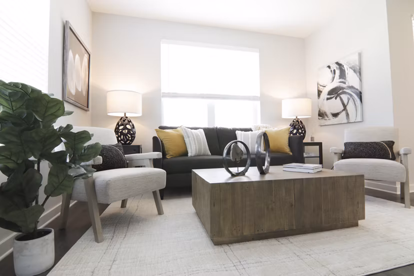 Modern living room with sleek furnishings at The Ravelle at Ridgeview Apartments