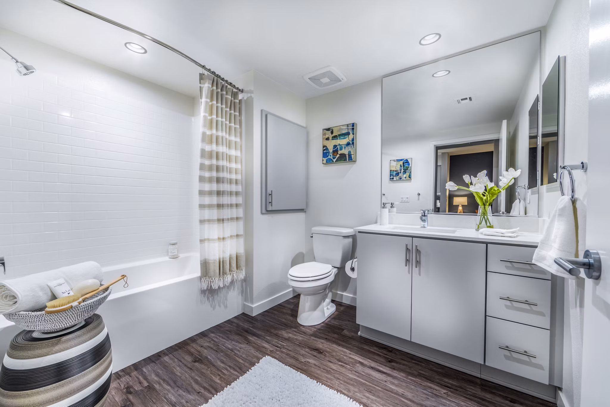Alcove Apartments: Modern bathroom with sleek fixtures and elegant design