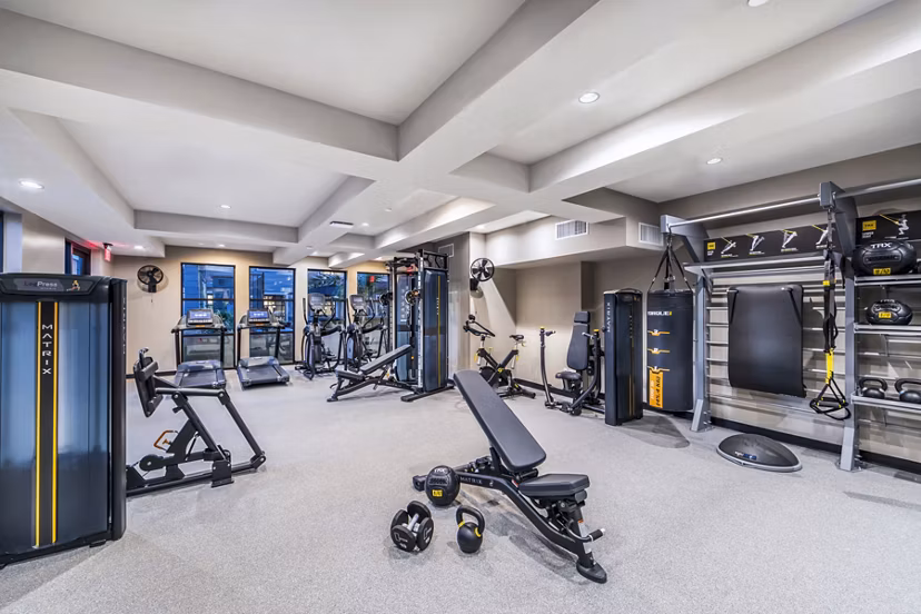 State-of-the-art fitness center with modern equipment at Alcove Apartments