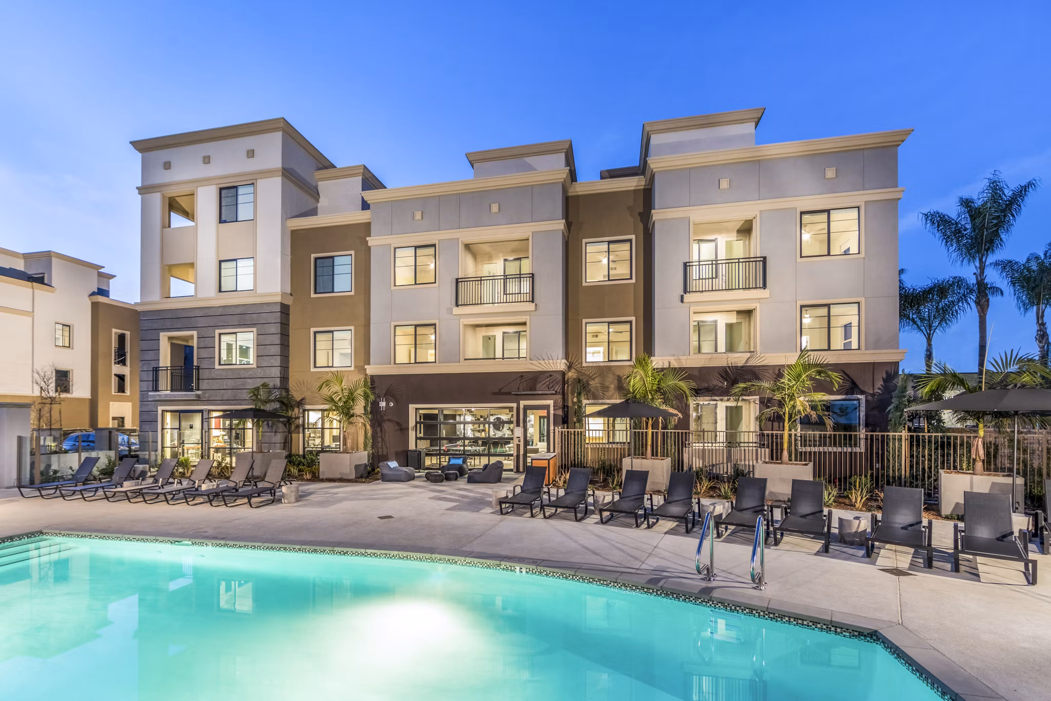 Heated outdoor pool at Alcove Apartments, perfect for relaxation and leisure in a luxurious setting