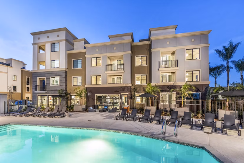 Heated outdoor pool at Alcove Apartments, perfect for relaxation and leisure in a luxurious setting