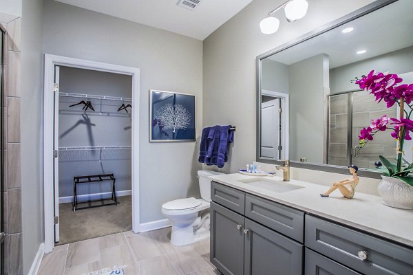 Luxurious bathroom with elegant fixtures at Everleigh Cool Springs Apartments