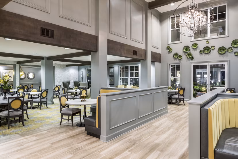 Clubhouse with modern decor and seating areas at Everleigh Cool Springs Apartments in Franklin, ideal for luxury gatherings and community events