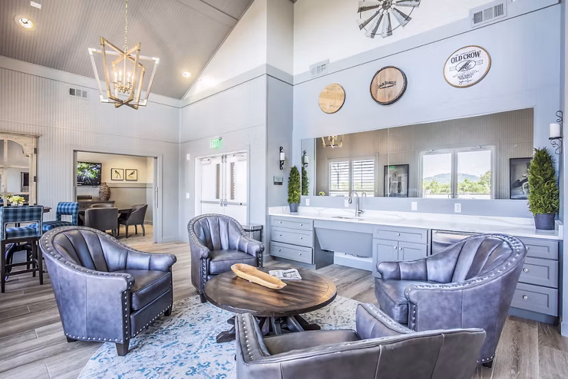 Elegant clubhouse with modern decor at Everleigh Cool Springs Apartments, ideal for gatherings and social events