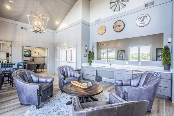 Elegant clubhouse with modern decor at Everleigh Cool Springs Apartments, ideal for gatherings and social events