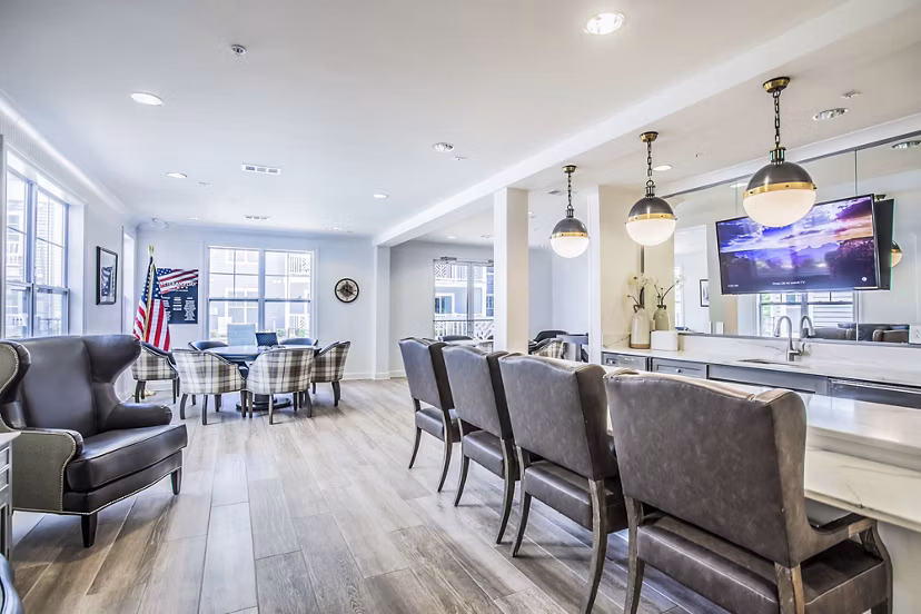 Clubhouse with modern interiors at Everleigh Cool Springs Apartments, featuring ample seating and stylish decor in Franklin, TN