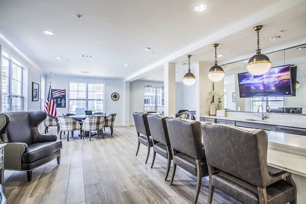 Clubhouse with modern interiors at Everleigh Cool Springs Apartments, featuring ample seating and stylish decor in Franklin, TN