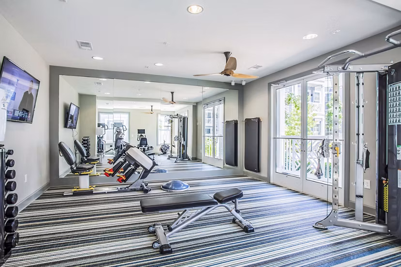 Well-equipped fitness center with modern equipment at Everleigh Cool Springs Apartments, ideal for active lifestyles